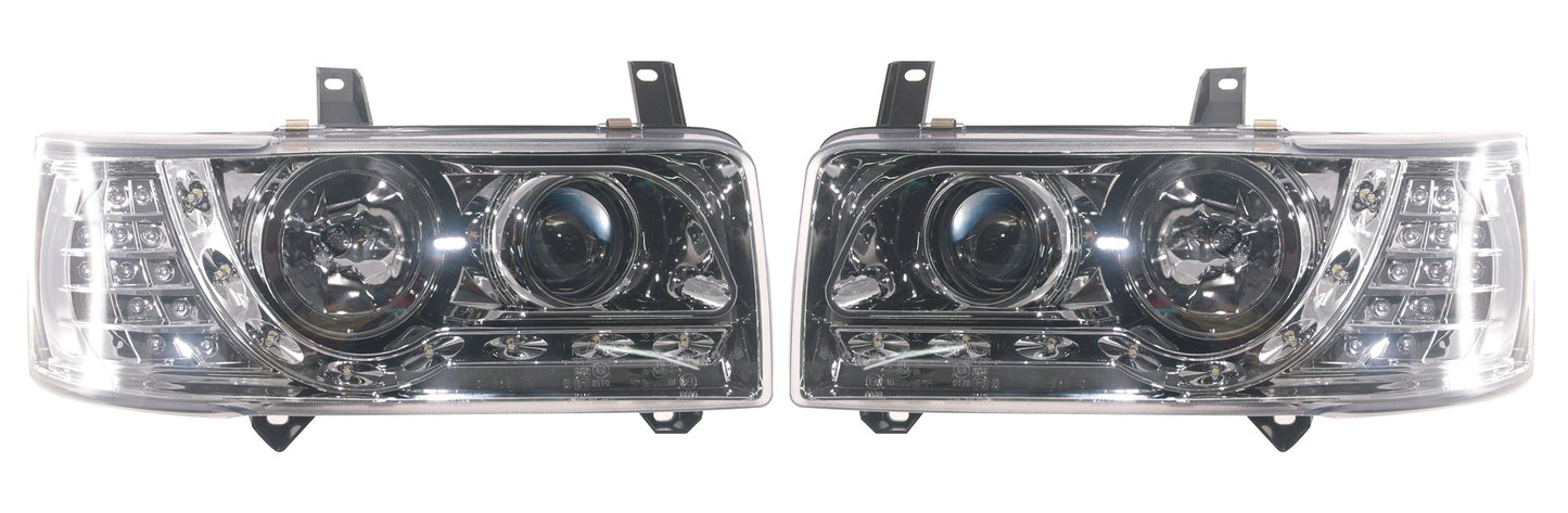 VW T4 Caravelle 1990-1997, T4 Transporter 1990-2003 (4-Cylinder Short Nose Models Only) Chrome DRL Headlights With LED Indicators.